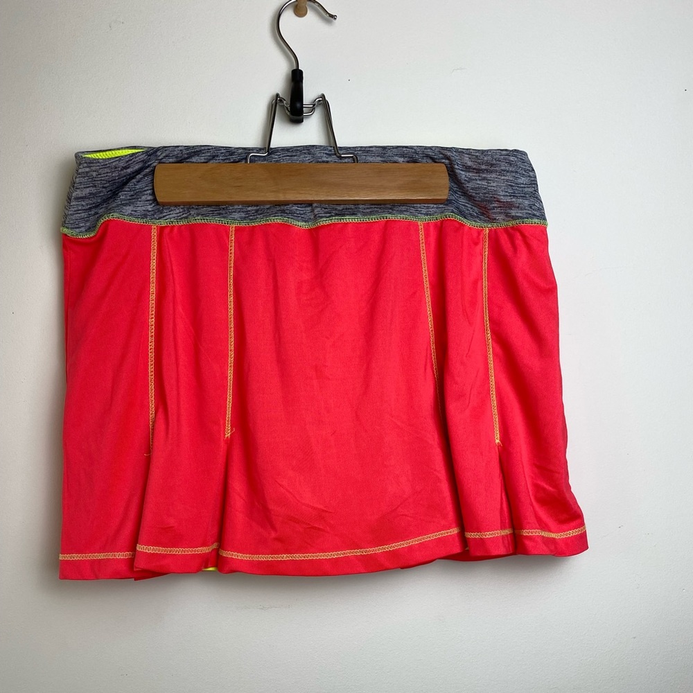 FILA orange and neon yellow athletic skirt